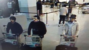 In this image provided by the Belgian Federal Police in Brussels on Tuesday, March 22, 2016 of three men who are suspected of taking part in the attacks at Belgium's Zaventem Airport. The man at right is still being sought by the police and two others in the photo that the police issued were according to a the Belgian Prosecutors 'probably' suicide bombers. Bombs exploded at the Brussels airport and one of the city's metro stations Tuesday, killing and wounding scores of people, as a European capital was again locked down amid heightened security threats. (Belgian Federal Police via AP)