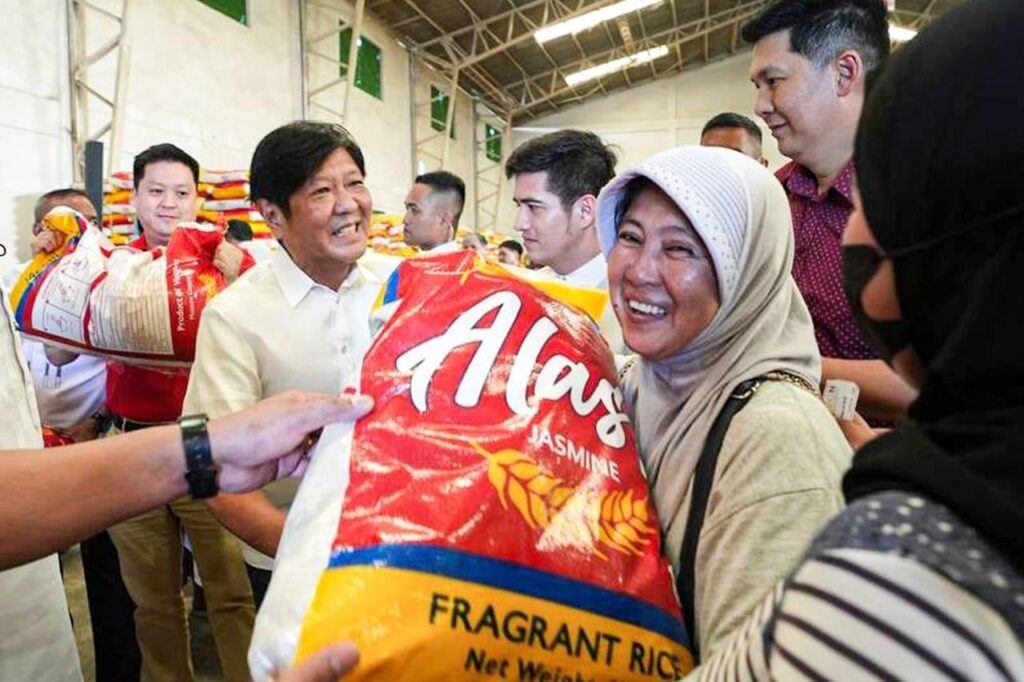 PUT TO GOOD USE President Marcos leads the distribution of smuggled rice in Zamboanga City and Zamboanga Sibugay. —MALACAÑANG PHOTO